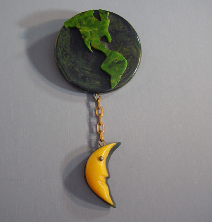 ADRIAN bakelite earth and crescent moon dangle brooch