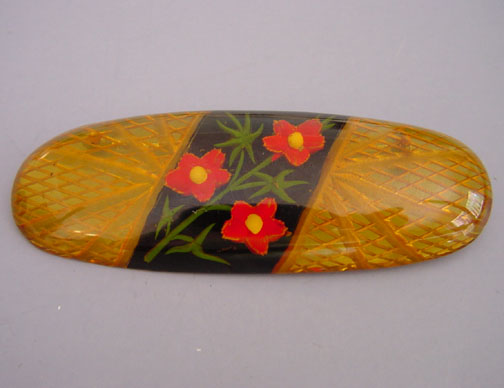 BAKELITE apple juice reverse carved brooch
