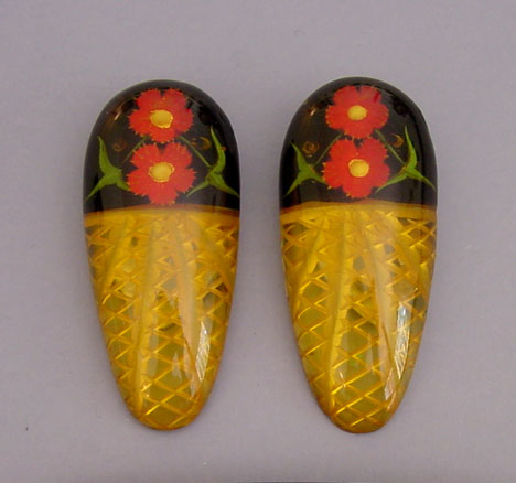 BAKELITE apple juice reverse carved clips