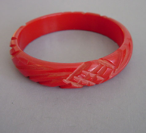 BAKELITE red apple bangle, pineapple carving