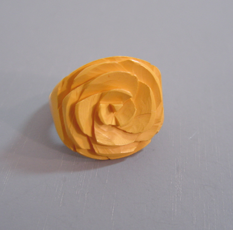 BAKELITE butterscotch flower carved ring