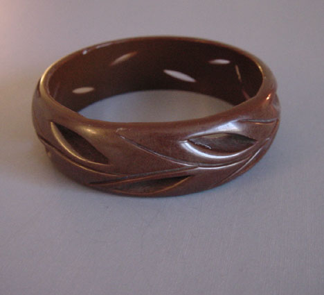 BAKELITE milk chocolate brown bangle, pierced and carved
