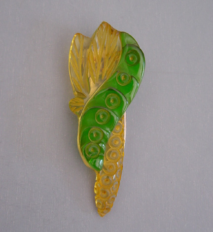 BAKELITE green and apple juice transparent clip