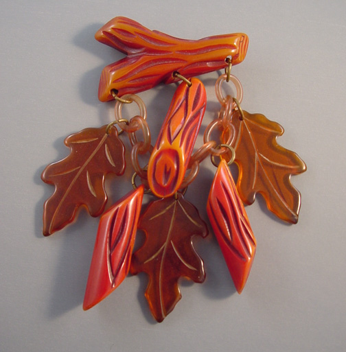 BAKELITE logs and leaves brooch circa 1940, over dyed butterscotch