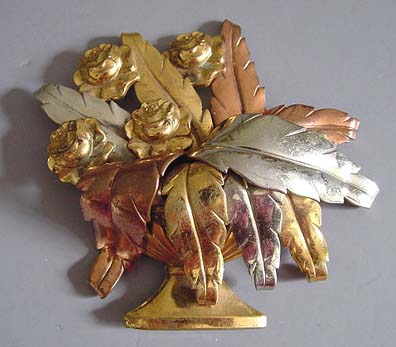 BASKET of flowers brooch, layers of tri-colored gilt leaves