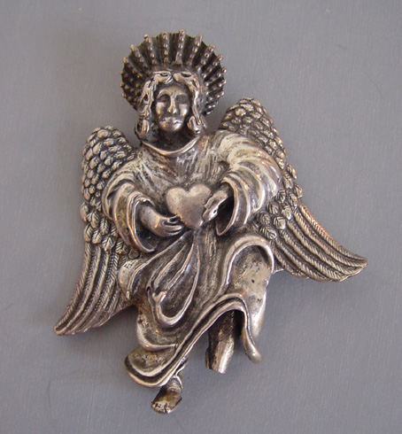 REBECCA COLLINS sterling silver cast angel brooch