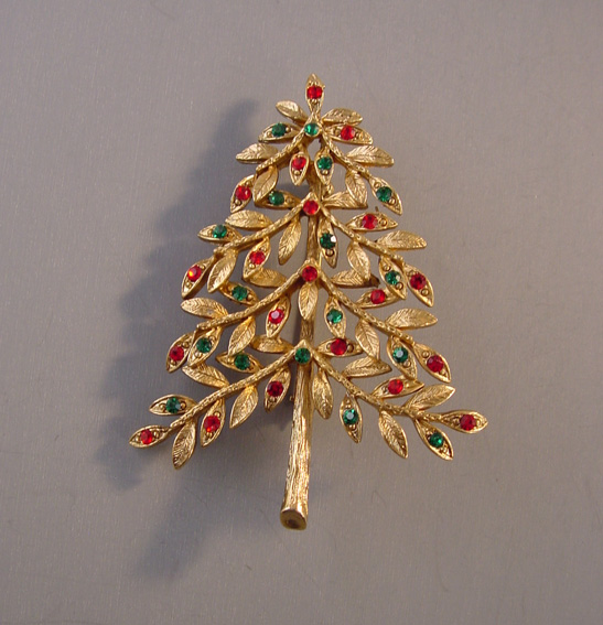 ART Christmas tree brooch with kidney bean shaped openings