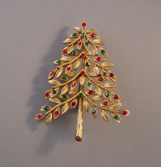 ART Christmas tree brooch with kidney bean shaped openings 26.00