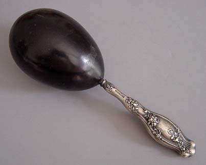 STERLING handled embossed floral design darner