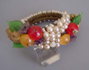 MIRIAM HASKELL Hess pearl, green, yellow, red coil bracelet
