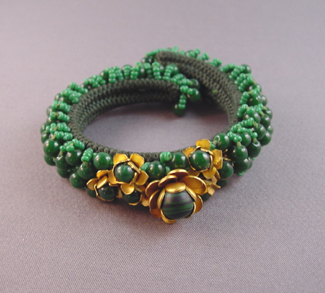 MIRIAM HASKELL Hess green glass bead coil bracelet