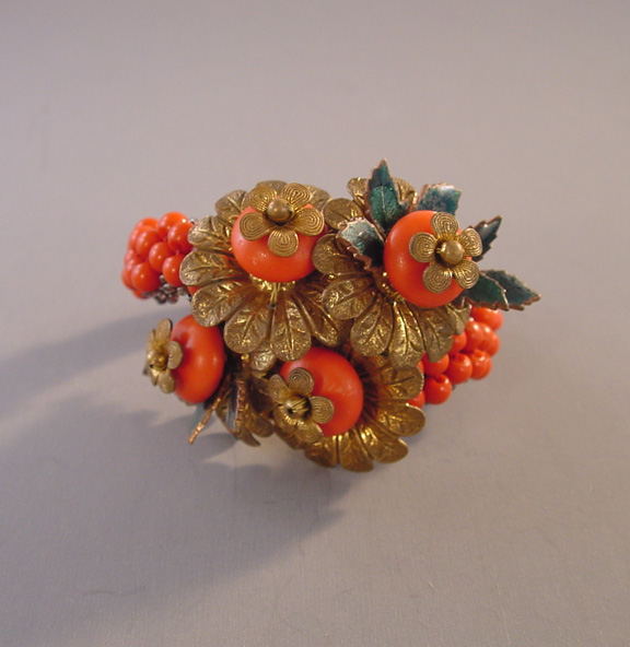 MIRIAM HASKELL Hess coil bracelet with orange beads
