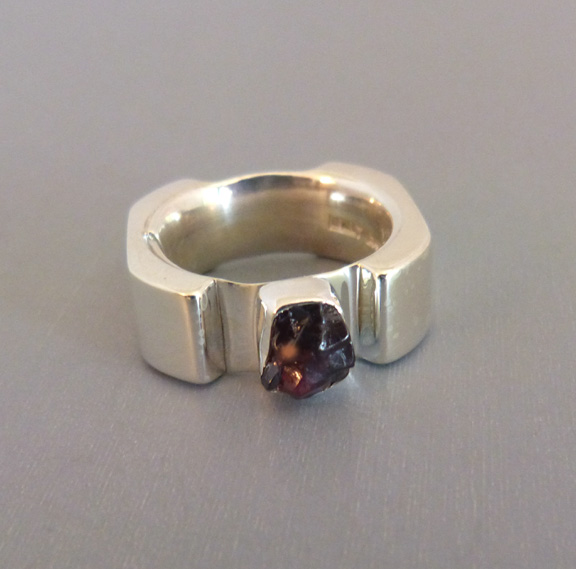 LILLY BARRACK sterling hand made ring with a garnet
