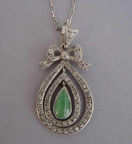 PASTE pendant with clear pastes & green center cabochon