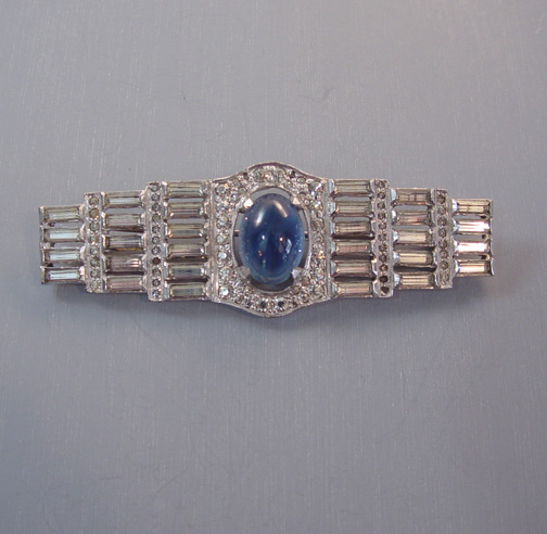 DECO style silver and blue cabochon brooch with baguettes