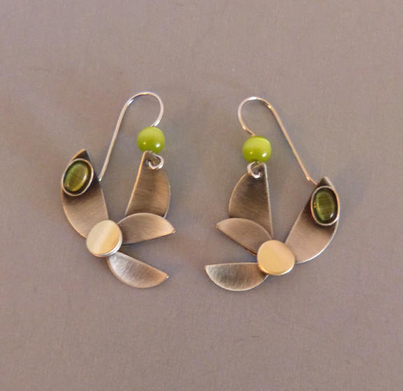 EARRINGS with stylized leaf design in silver semi-matte