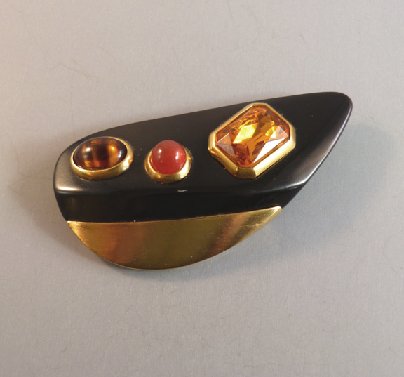 KAI-YIN LO brooch in an amoebic shaped black resin 1994