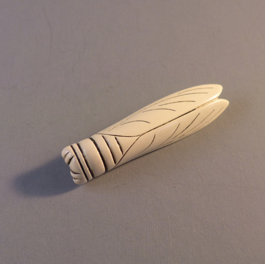 CELLULOID insect brooch with black painted details, 1930