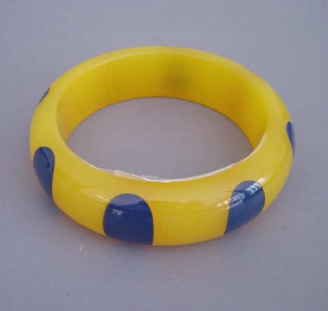 SHULTZ bakelite translucent yellow bangle, blue dots