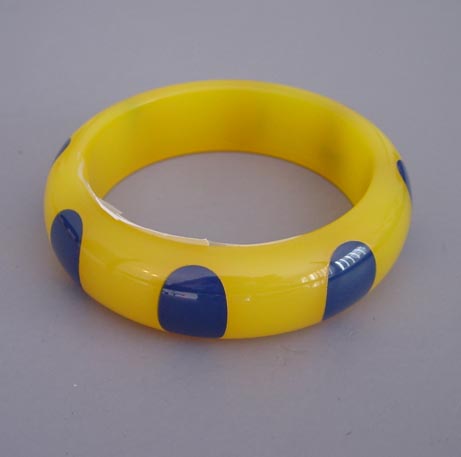 SHULTZ bakelite translucent yellow bangle, blue dots