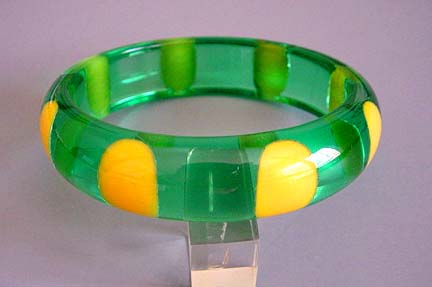 SHULTZ bakelite green transparent bangle, yellow dots