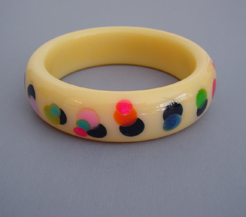 SHULTZ bakelite creamy yellow bangle, confetti dots