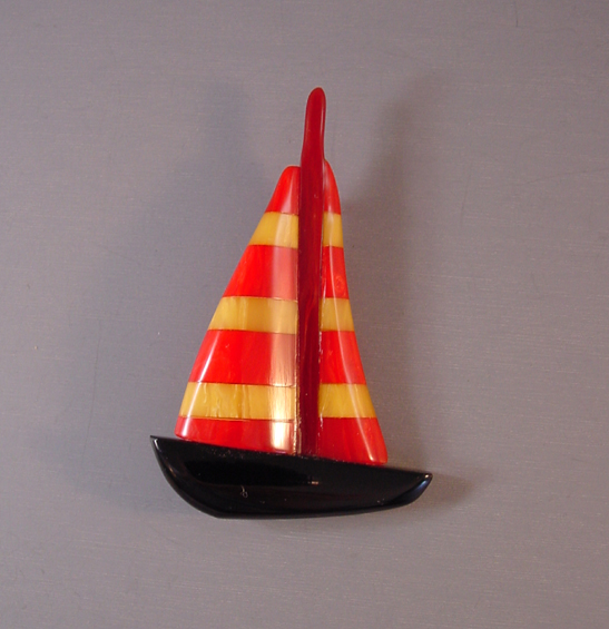 SHULTZ bakelite sailboat brooch red & yellow