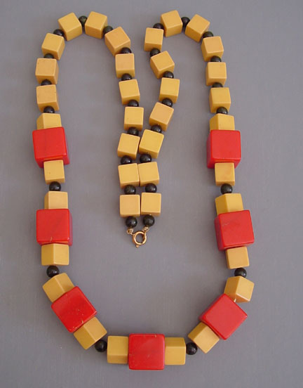 SHULTZ bakelite necklace of butterscotch, red necklace