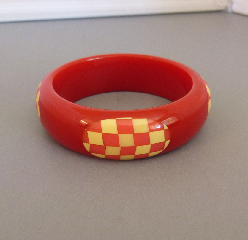 SHULTZ bakelite red bangle with pink and cream checked dots