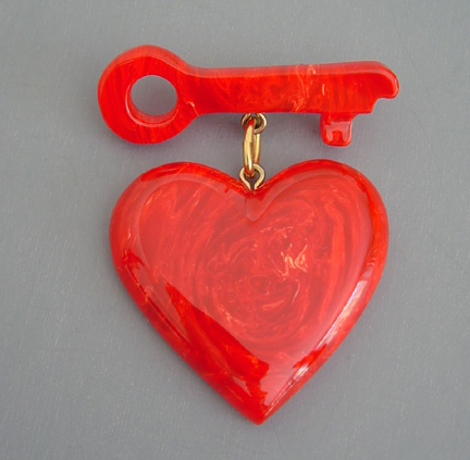 SHULTZ bakelite red marbled heart key brooch
