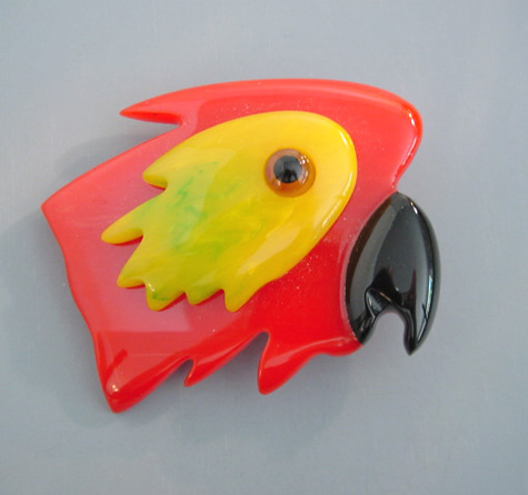SHULTZ bakelite parrot head brooch in red