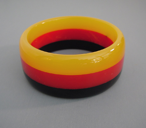 SHULTZ bakelite 3 row laminated bangle red yellow black