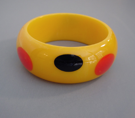 SHULTZ bakelite yellow bangle red green black dots