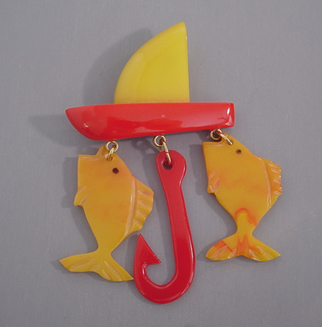 SHULTZ bakelite red and yellow sail boat & fish pin