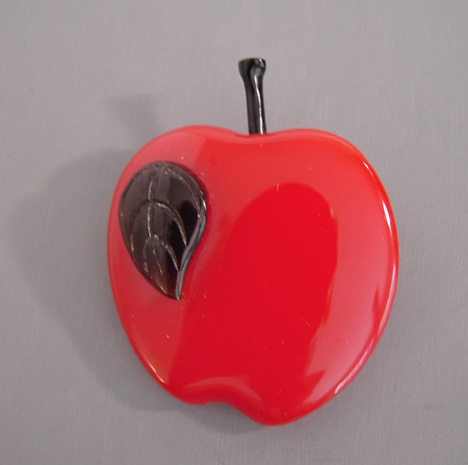 SHULTZ bakelite red apple brooch with black leaf
