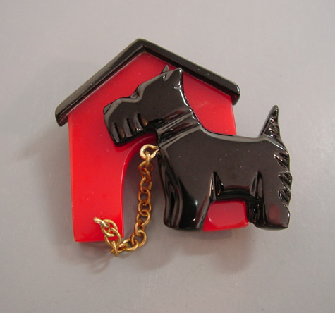 SHULTZ bakelite red and black dog & doghouse brooch