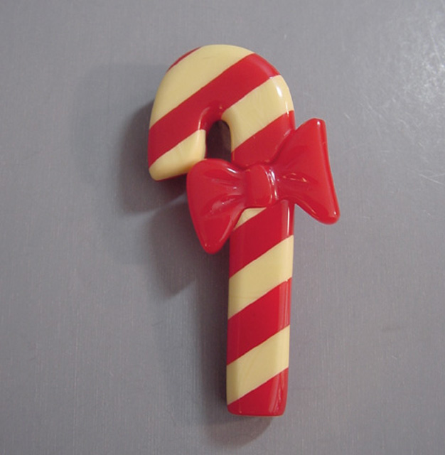 SHULTZ bakelite Christmas red and cream candy cane brooch
