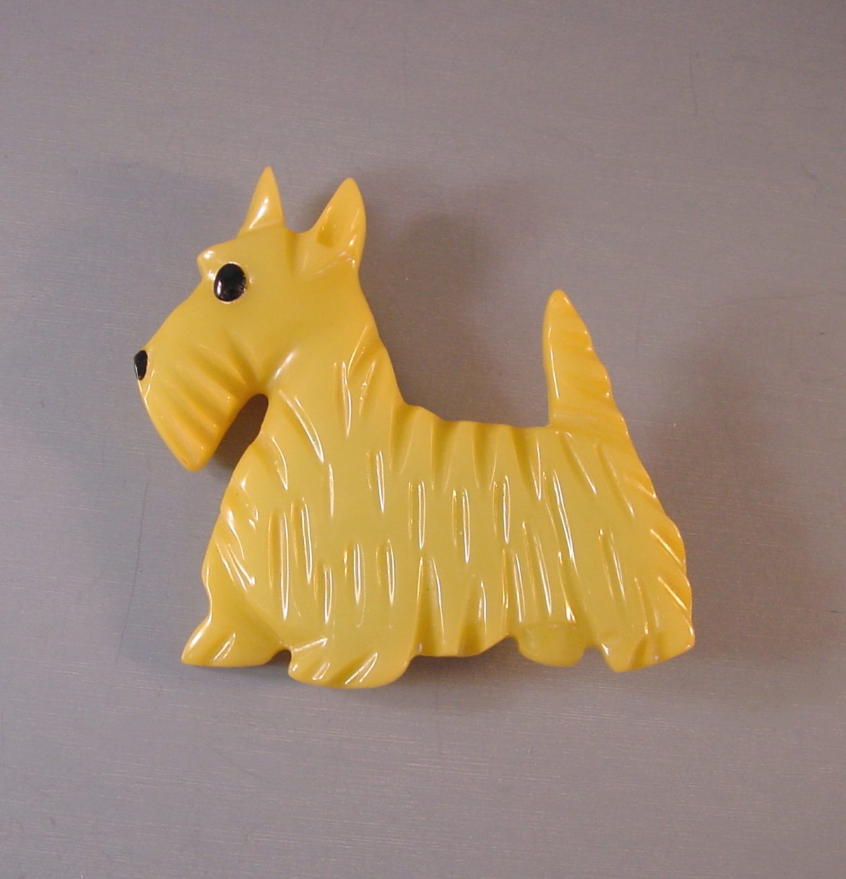 SHULTZ bakelite pale yellow Scotty dog brooch