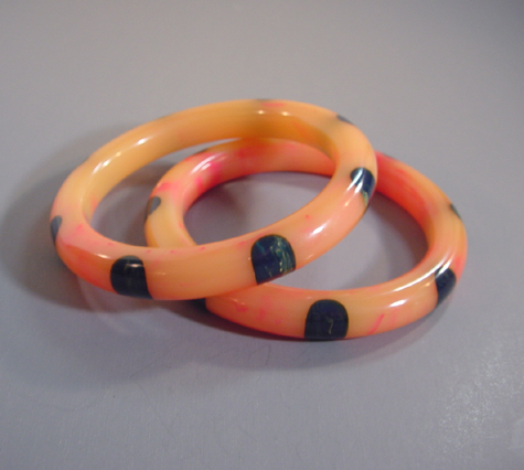 SHULTZ bakelite pink swirl bangles with blue dots