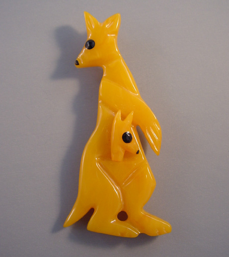 SHULTZ bakelite yellow carved kangaroo baby kangaroo brooch