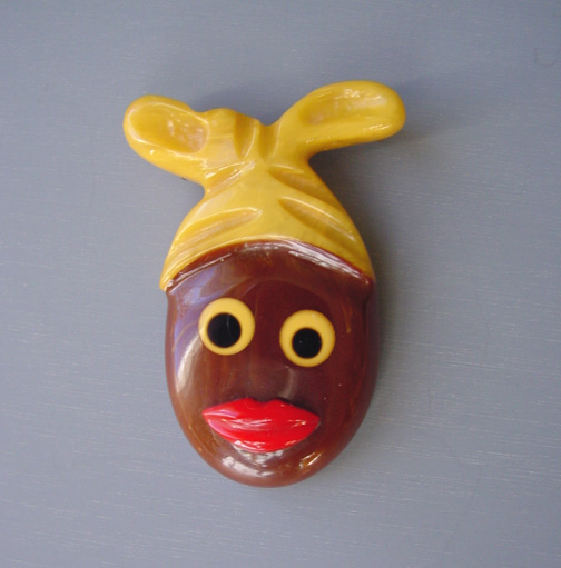 SHULTZ bakelite turbaned ethnic lady brooch in brown, red, yellow