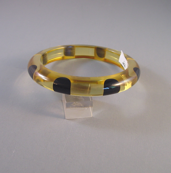 SHULTZ bakelite apple juice bangle, book piece