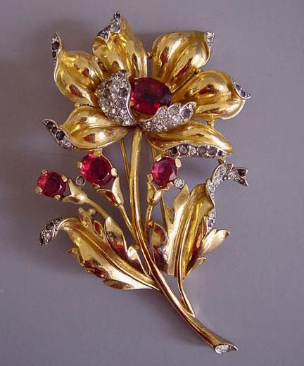 TRIFARI gold tone flower, buds and leaves fur clip