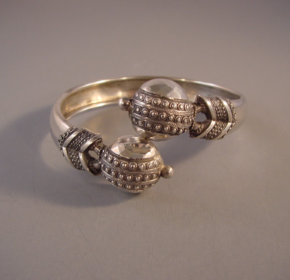 VICTORIAN sterling silver coil cross-over bangle with registrati