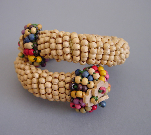 CZECH natural wooden seed bead coil bracelet with multi-colored dyed tips