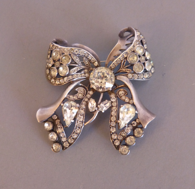 EISENBERG ORIGINAL sterling and clear rhinestones bow brooch