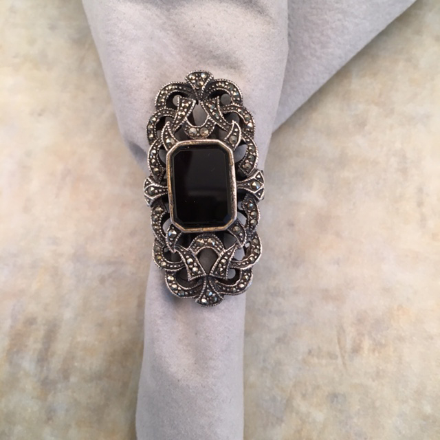 MARCASITE sterling ring with a polished black center