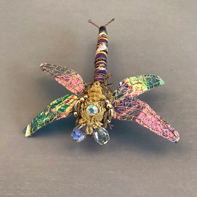 Kimk Co dragon fly brooch made of fabric and crystal, 4-1/4″ long