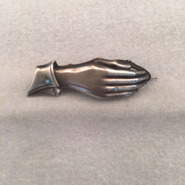 VICTORIAN sterling silver hand pin/clip with tiny turquoise in her ring