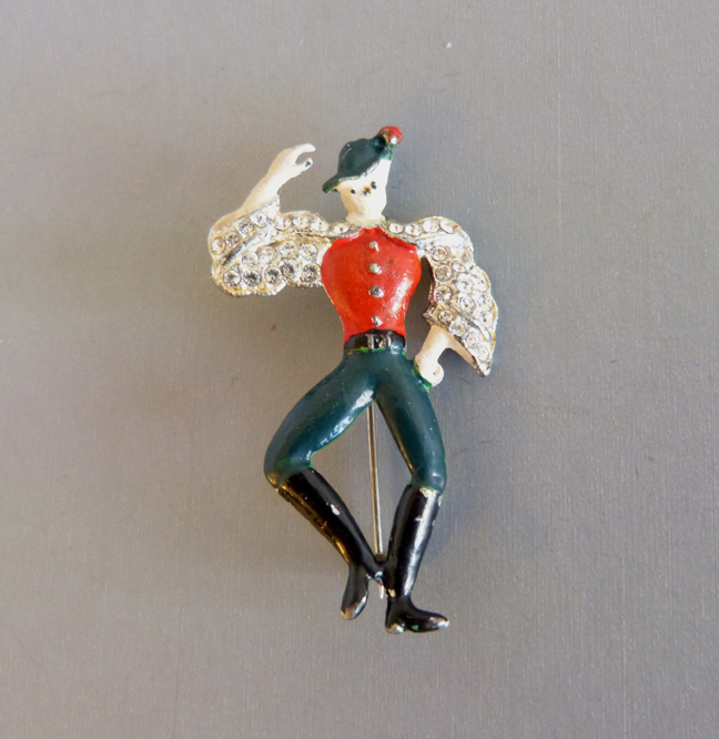 FIGURE red, dark blue and black enamel figural dancing man pin